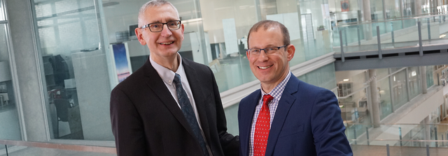Dr. Vic Adamowicz, outgoing Research Director, with Dr. Eran Kaplinsky, incoming Research Director.